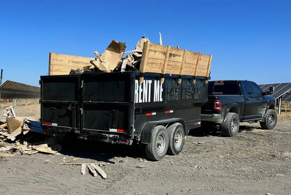 Solo Junk loaded dumpster trailer